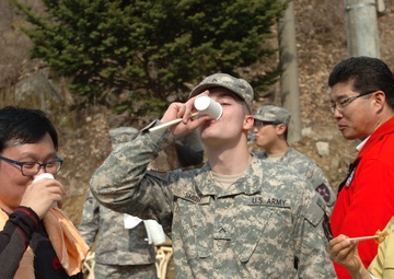 Warrior Brigades plant trees for Arbor Day