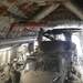 Army, Air National Guard members load HC-60 Black Hawk on board a C-17