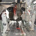 Army and Air National Guard members loading HC-60 Black Hawk on board a C-17