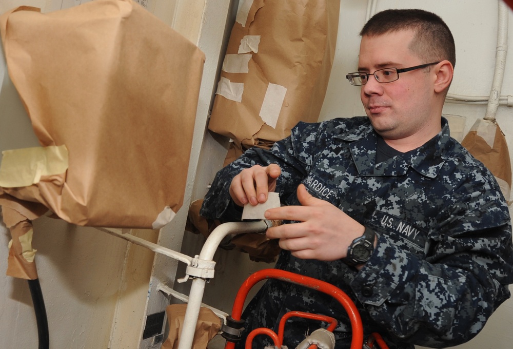 USS Nimitz sailors at work USS Nimitz sailors at work