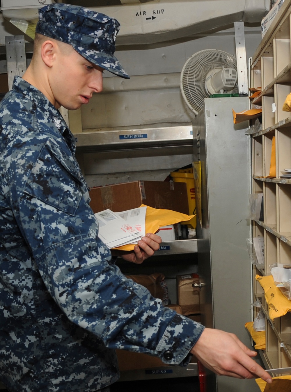 USS Nimitz sailors at work