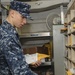 USS Nimitz sailors at work