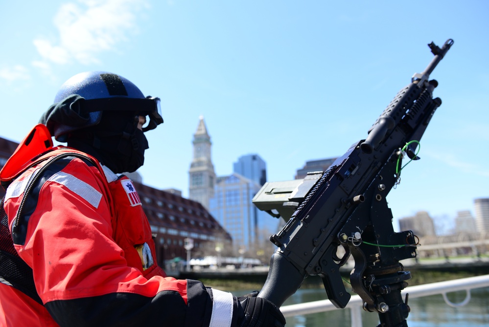 A crew member from Station Boston conducts security zones in the Boston Harbor