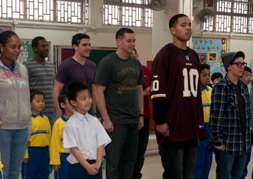 Peleliu sailors and Marines volunteer at Hong Kong school