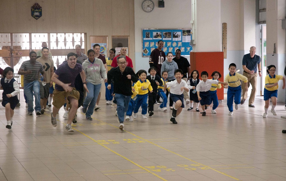 Peleliu sailors and Marines volunteer at Hong Kong school