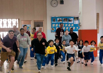 Peleliu sailors and Marines volunteer at Hong Kong school