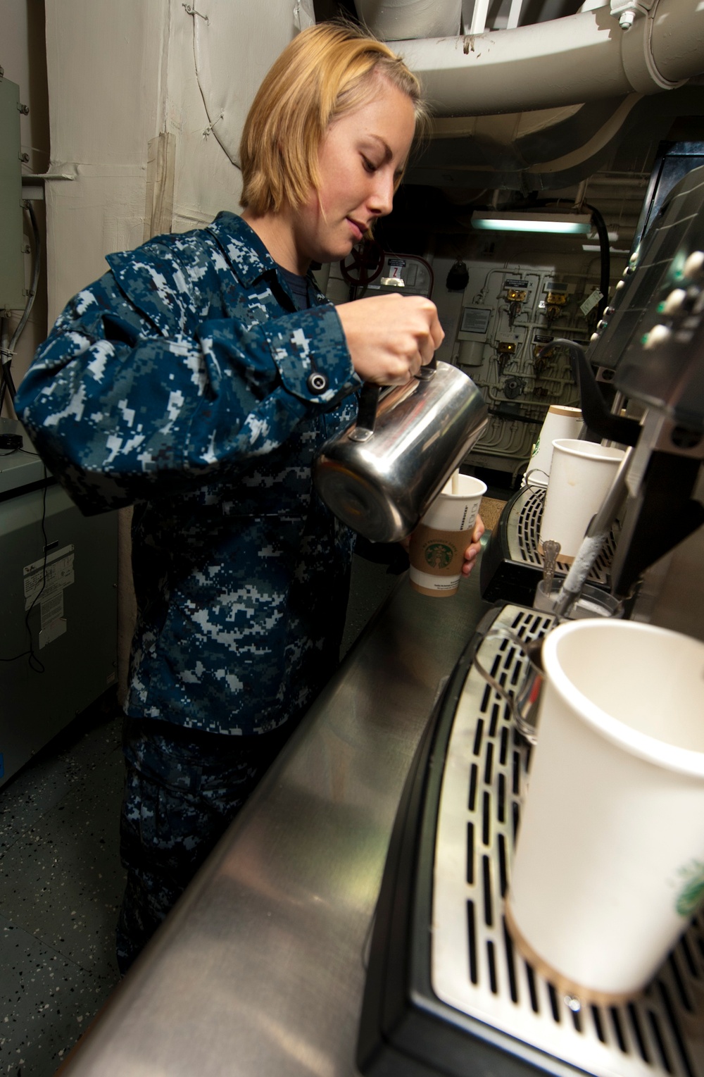 Sailor makes coffee