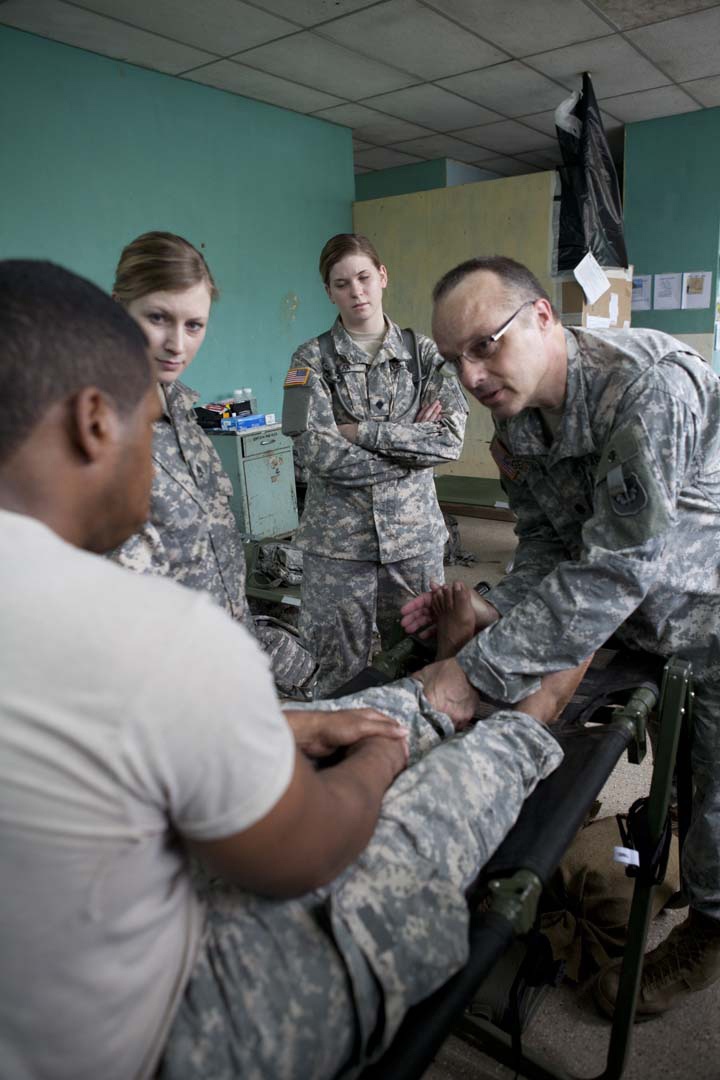 Joint Task Force Medics treat a soldier
