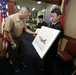 Marine Aircraft Group 12 receives paintings from local artist