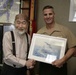 Marine Aircraft Group 12 receives paintings from local artist
