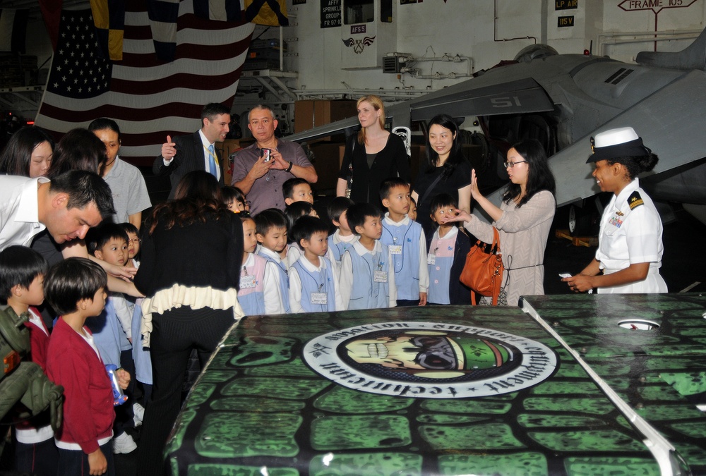 Children visit USS Peleliu