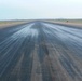 97th CES saves bucks, clears runway friction