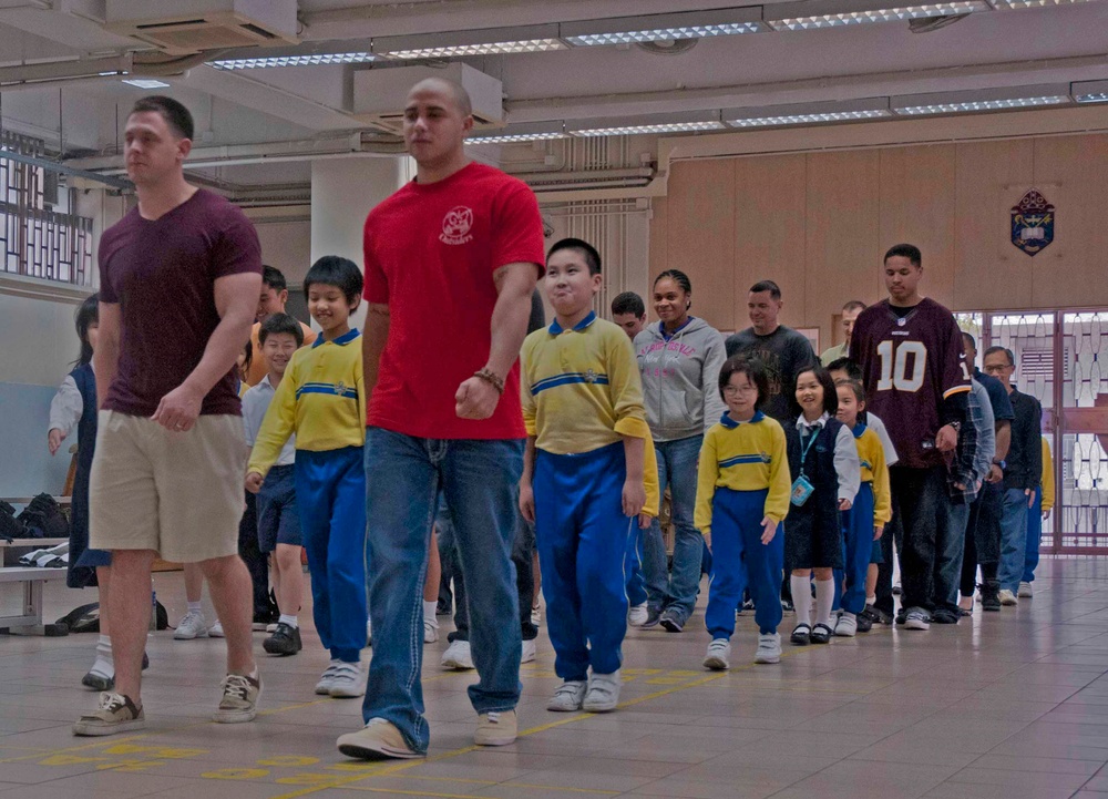Peleliu Sailors and Marines Volunteer at Hong Kong School