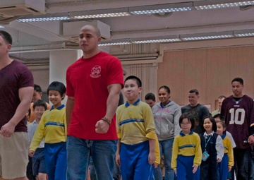Peleliu Sailors and Marines Volunteer at Hong Kong School