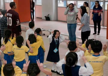 Peleliu Sailors and Marines Volunteer at Hong Kong School