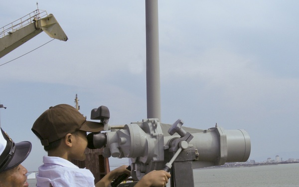 Child looks through 'big eyes'