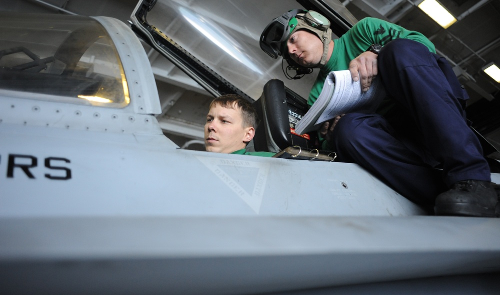 USS Nimitz sailors perform maintenance