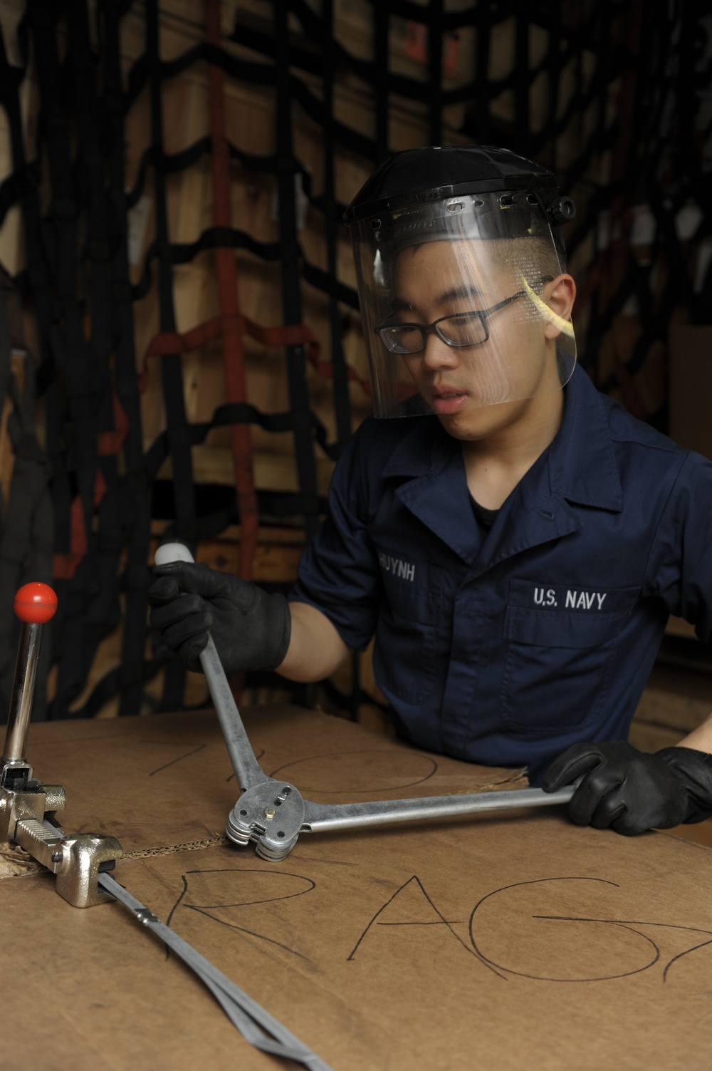 USS Nimitz sailor at work