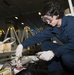 USS Harry S. Truman sailor at work