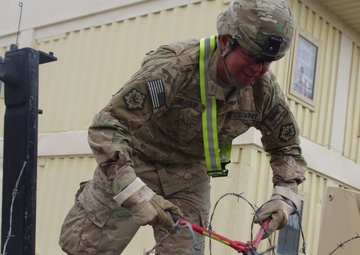 Concertina wire Can't Stop the 864th Engineer Battalion