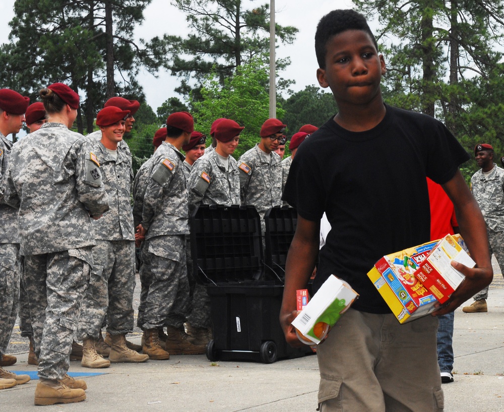 XVIII Airborne Corps paratroopers donate to local school