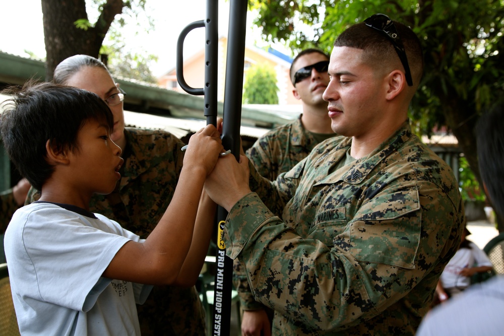 Philippines, US service members are ‘shoulder-to-shoulder’ in visit to orphanage