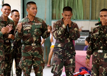 Philippines, US service members are ‘shoulder-to-shoulder’ in visit to orphanage