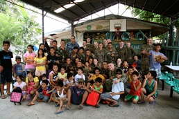 Philippines, US service members are ‘shoulder-to-shoulder’ in visit to orphanage