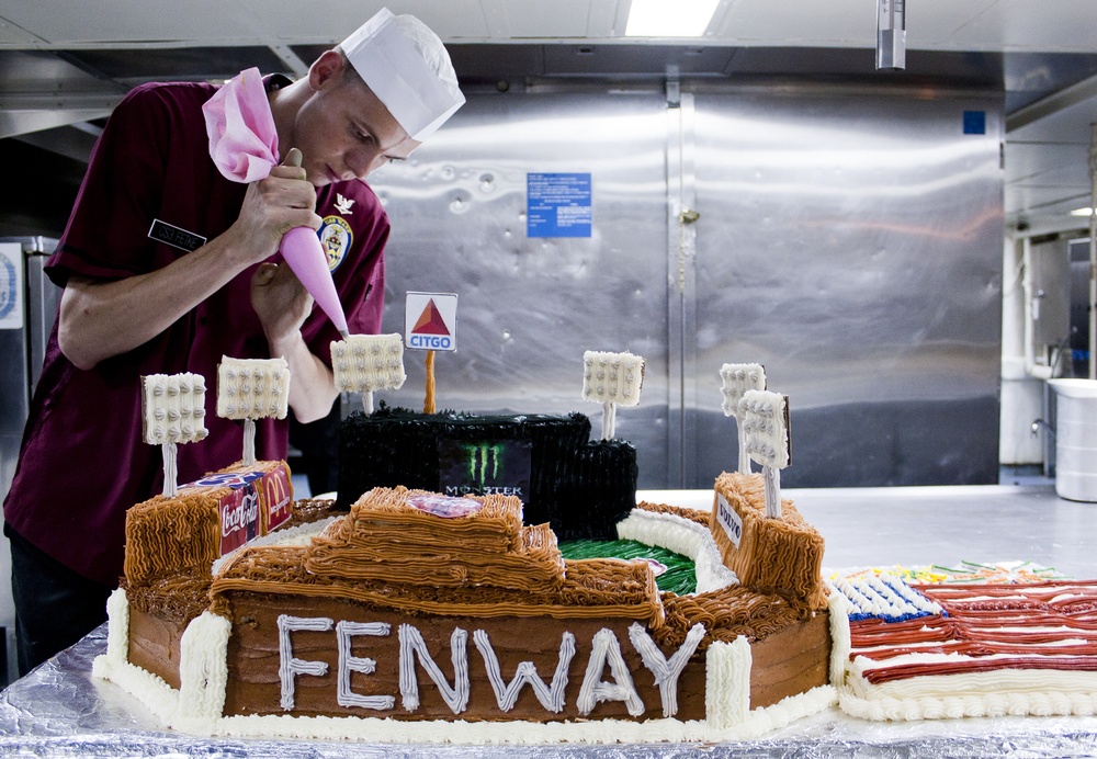 USS Wasp sailor decorates cake