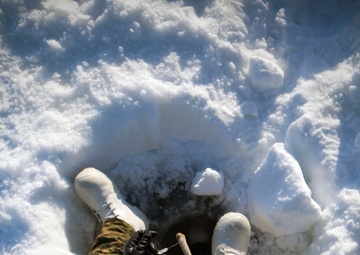 Marines ice fish with Alaskan natives