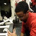 USS Nimitz sailor removes wheel