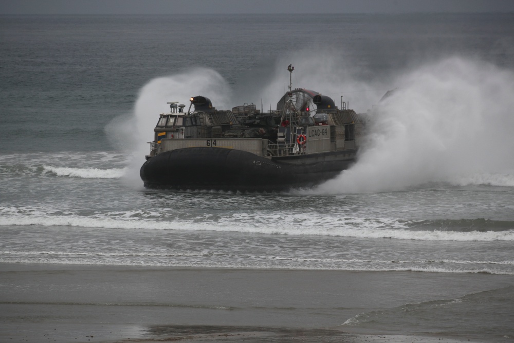 Light armored reconnaissance Marines unite with Navy for amphibious landing