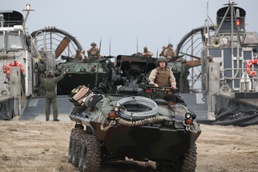 Light armored reconnaissance Marines unite with Navy for amphibious landing