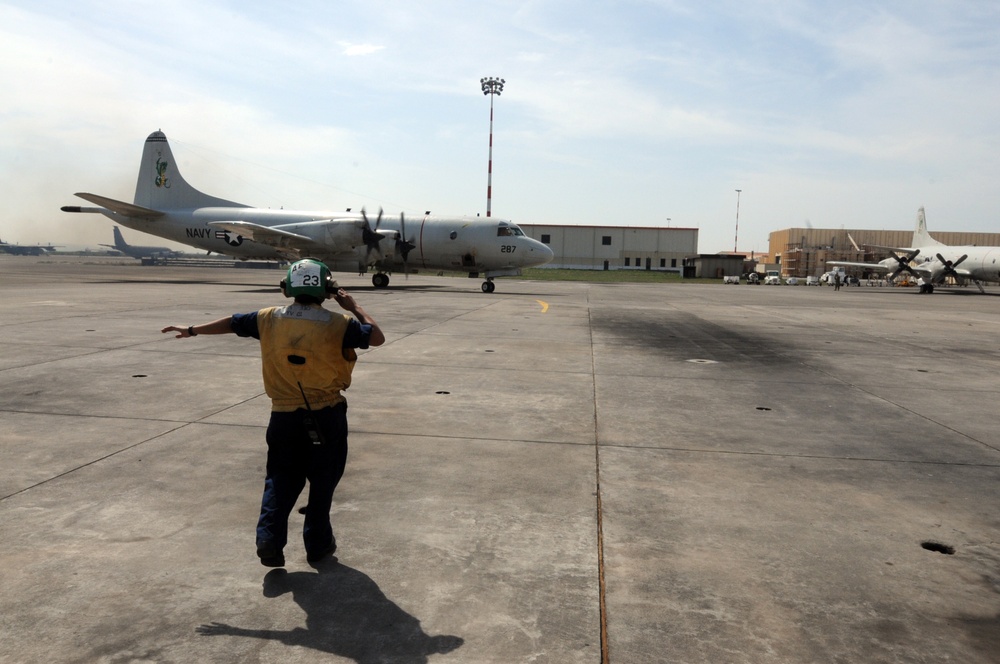 VP-4 sailor gives the signal