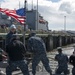 USS Ford sailors heave a line