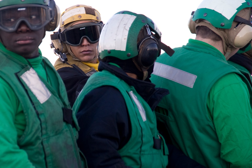 Sailors wait before general quarters training