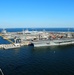 The aircraft carrier USS Dwight D. Eisenhower (CVN 69) makes its approach pierside at Naval Station Norfolk after a six-month deployment to the U.S. 5th and 6th Fleet areas of responsibility in support of Operation Enduring Freedom, maritime security oper