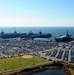 The aircraft carrier USS Dwight D. Eisenhower (CVN 69) makes its approach pierside at Naval Station Norfolk after a six-month deployment to the U.S. 5th and 6th Fleet areas of responsibility in support of Operation Enduring Freedom, maritime security oper