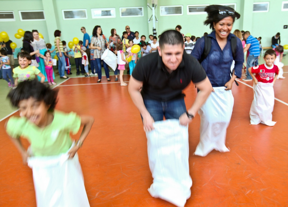 Marines lend a helping hand to children