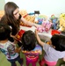 Marines lend a helping hand to children