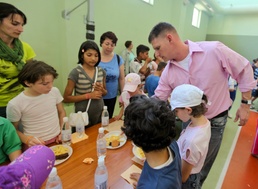 Marines lend a helping hand to children