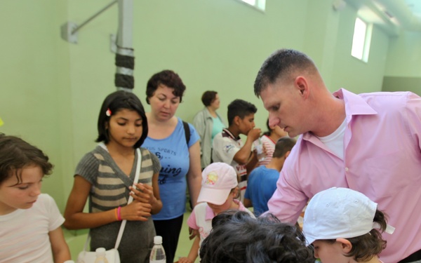 Marines, sailors lend a helping hand to children in Romania