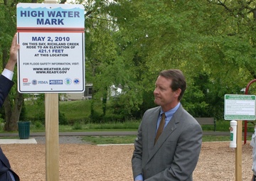 Sign marks flood awareness initiative on third anniversary of May 2010 flood