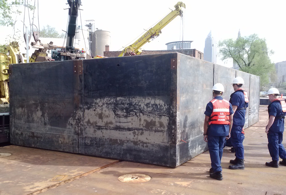 Sunken deck barge in Cuyahoga River salvaged
