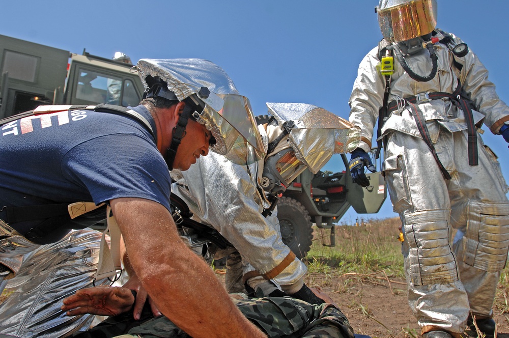 Military firemen train along with Puerto Rico's Fire Department firemen