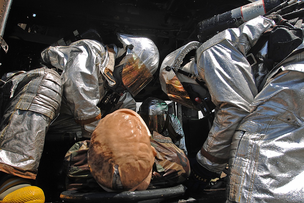 Military firemen train along with Puerto Rico's Fire Department firemen
