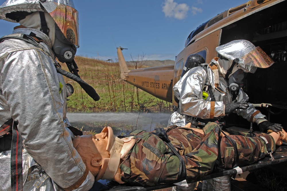 Military firemen train along with Puerto Rico's Fire Department firemen