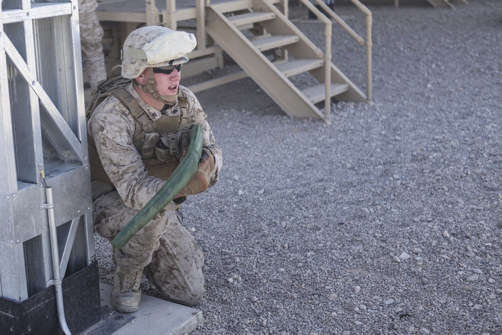 The Marines of Echo Company 2/8 participate in MRAP egress training