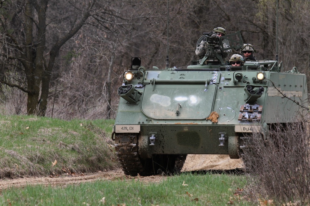 Soldiers with the 428th Engineer Company navigate a M113A3 Armored Personnel Carrier while conducting training during Warrior Exercise (WAREX)