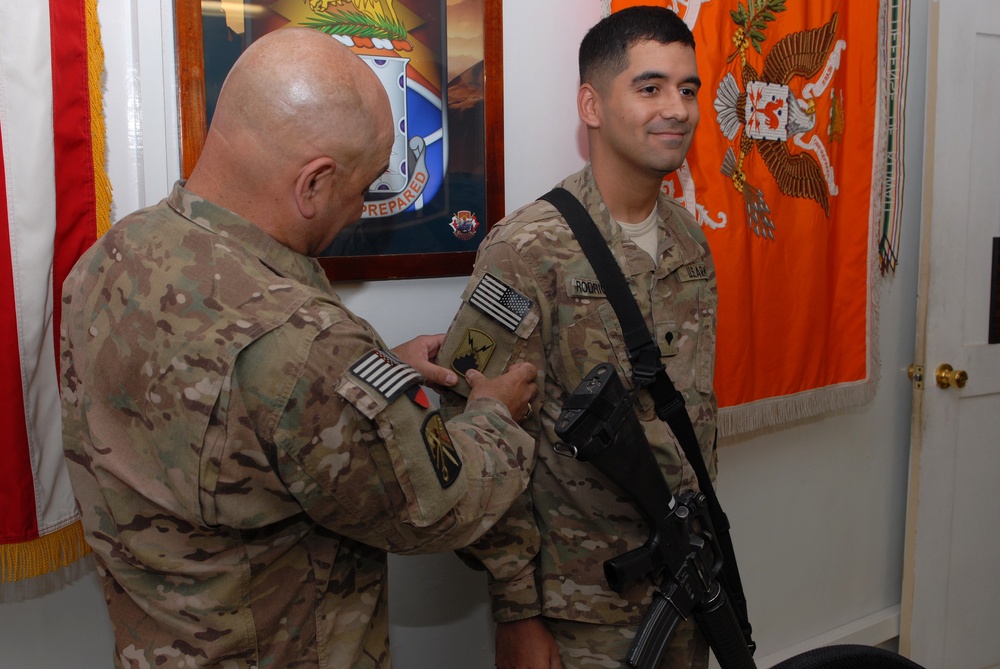 Father presents son with combat patch in Afghanistan